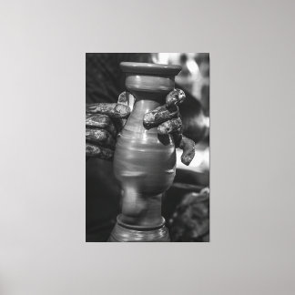 The Master’s Touch: Traditional Pottery Shaping in Canvas Afdruk