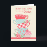 Thee kopjes en Rozen, Happy Birthday Sister Kaart<br><div class="desc">Vier de speciale verjaardag van een zuster met deze  kaart met een set theekopjes in bloemenpracht,  polka dot- en gingham-patronen,  roze rozen en een cupcake met roze polka dots harttopping. Achtergrond is crème met een koraal kant lint grafische rand. Graphics©MyClipartStore</div>