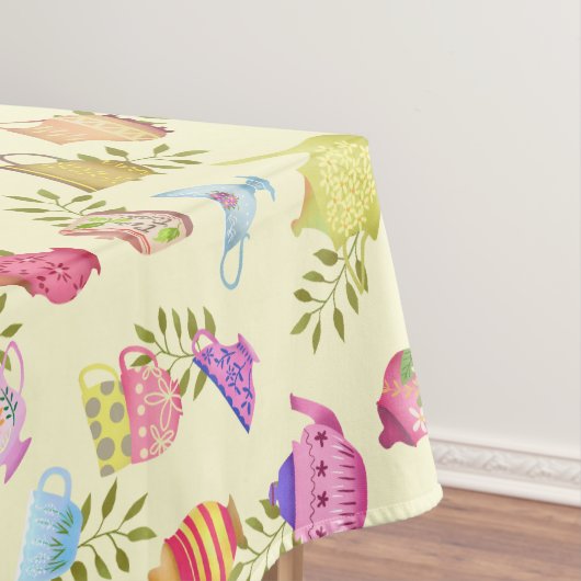 Thee potten en kopjes geel tafelkleed (Voorbeeld)