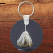 Thee zakje hangt in een kop sleutelhanger (Voorkant)