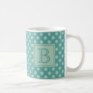 Theelogo met polka stippenpatroon koffiemok