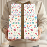theepartij en koffiepatronen inpakpapier vel<br><div class="desc">Het zoete theepartijpatroon wordt gemaakt in waterverven blauwen, paars en roze theeketels en bekertjes met groene vlekken en theebladeren op een witte achtergrond. Het koffiepatroon wordt gemaakt in blauwe en groene koffieketels en blauwe gestreepte en rode bekertjes met koffiebonen en koffiebrinder. Ideaal voor een bruidthee feestje of een meisje's verjaardagstheefeestje....</div>
