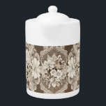 Theepot met  kanten crème & donkerbruin<br><div class="desc">Theepot met crème en een donkerbruin faux lace ontwerp met een kleine hoeveelheid van een lichtblauw in sommige van de bloemen. Bedankt voor Creative Fabrica voor enkele van de onderdelen in het ontwerp.</div>