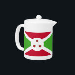 Theepot met vlag van Burundi<br><div class="desc">Voeg een vleugje Burundese trots toe aan je theetijd met onze exclusieve theepot met de vlag van Burundi! Deze theepot is gemaakt met nauwgezette aandacht voor detail en is meer dan alleen een functioneel keukenitem; het is een viering van het erfgoed en de culturele trots van Burundi. Het levendige ontwerp...</div>