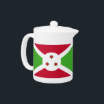 Theepot met vlag van Burundi<br><div class="desc">Voeg een vleugje Burundese trots toe aan je theetijd met onze exclusieve theepot met de vlag van Burundi! Deze theepot is gemaakt met nauwgezette aandacht voor detail en is meer dan alleen een functioneel keukenitem; het is een viering van het erfgoed en de culturele trots van Burundi. Het levendige ontwerp...</div>