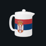 Theepot met vlag van Servië<br><div class="desc">Voeg een vleugje Servische trots toe aan je theetijd met deze elegante theepot met de vlag van Servië! Ontworpen voor zowel functie als nationale trots, toont deze stijlvolle theepot de levendige kleuren en het embleem van de Servische vlag, waardoor het een zinvolle en opvallende toevoeging is aan elke keuken of...</div>