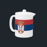 Theepot met vlag van Servië<br><div class="desc">Voeg een vleugje Servische trots toe aan je theetijd met deze elegante theepot met de vlag van Servië! Ontworpen voor zowel functie als nationale trots, toont deze stijlvolle theepot de levendige kleuren en het embleem van de Servische vlag, waardoor het een zinvolle en opvallende toevoeging is aan elke keuken of...</div>