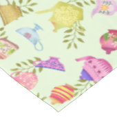 Theepotten en kopjes groen tafelkleed (Gekanteld)