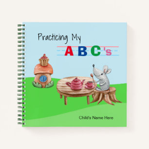 Theetijd en een B C's spiraal Notitieboek