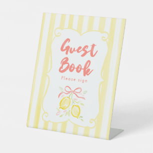 Thema meisje baby shower gast boek met citroen reclamebord met voetstuk