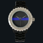 Thin Blue Line Horloge<br><div class="desc">De Thin Blue Line is een verzamelnaam voor politiemachten. Het kan verwijzen naar de politie als een "lijn" tussen goed en kwaad (burgers en daders), of kan verwijzen naar de "lijn" die de politie scheidt als in-groep van iedereen (met positieve, negatieve of gemengde connotaties, afhankelijk van de persoon die de...</div>