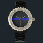 Thin Blue Line Horloge<br><div class="desc">De Thin Blue Line is een verzamelnaam voor politiemachten. Het kan verwijzen naar de politie als een "lijn" tussen goed en kwaad (burgers en daders), of kan verwijzen naar de "lijn" die de politie scheidt als in-groep van iedereen (met positieve, negatieve of gemengde connotaties, afhankelijk van de persoon die de...</div>