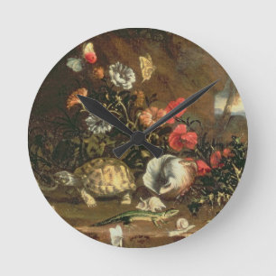 Thistles, bloemen, reptielen en vlinders naast elk ronde klok