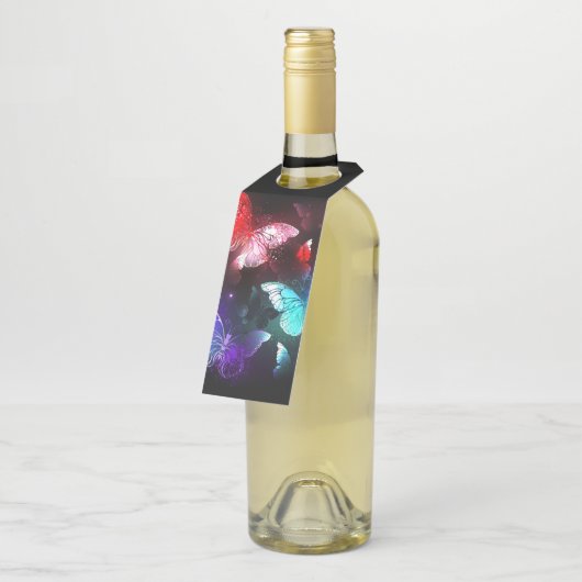 Three Glowing Butterflies on night background Flessenhanger (Schuin)