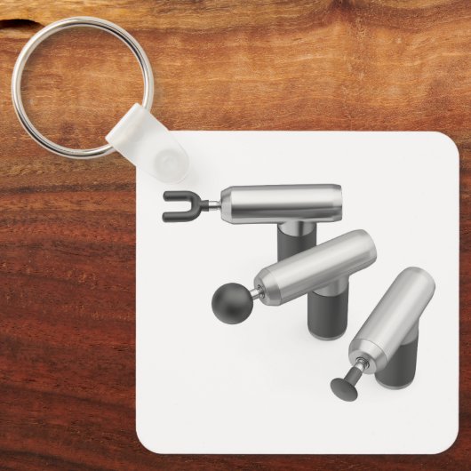 Three massage guns with different massage heads sleutelhanger (Voorkant)