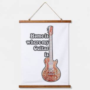 Thuis is waar mijn gitaar is.  bruine gitaar hangend wandkleed