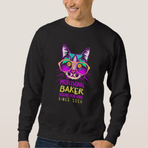 Thuiswerkende bakker bakt kattengebak chef kit trui