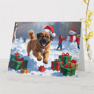 Tibetaanse Mastiff rent in de sneeuw met kerstmuts Kaart