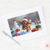 Tibetaanse Spaniel loopt in de sneeuw met kerst Pe Rechthoekige Sticker (Envelop)