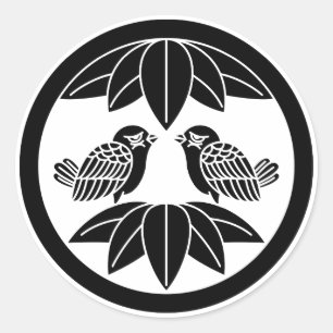 Tien bamboe-bladeren en pijltjes in cirkel ronde sticker