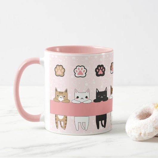 Tiernos gatitos en fondo rosa con flores mok (Met donut)
