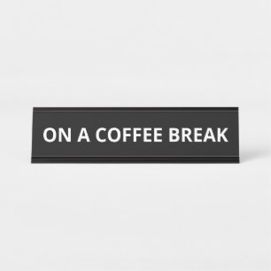 TIJDENS EEN KOFFIEPAUZE BUREAU NAAMBORDJE