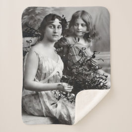 Tijdloos portret van moeder en dochter sherpa deken