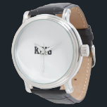 Tijdloze "KING" Black Leather Strap Horloge voor M<br><div class="desc">Stijl: Mannen Vintage Black Leather Strap Watch Design: Dit geavanceerde horloge in stijl is voorzien van een premium zwarte lederen band die tijdloze elegantie uitstraalt. De wijzerplaat toont trots het woord "KING" in vet, luxe print, symbool van kracht en autoriteit. Gemaakt voor mannen die een mix van klassieke en moderne...</div>