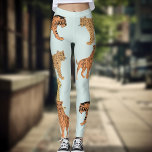 Tijger, Cheetah en luipaard Leggings<br><div class="desc">Tiger,  cheetah en luipaard tekeningen tegen een zeer lichte turkooisachtergrond.</div>