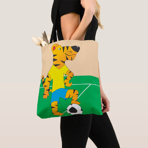 Tijger speelt voetbal tote bag