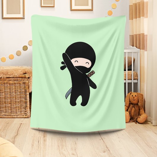Tiny Happy Ninja over Green Fleece Deken