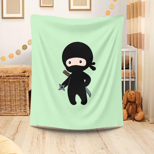 Tiny Ninja Holding Droingster op groen Fleece Deken