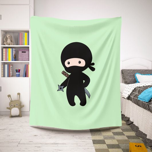 Tiny Ninja Holding Throwing Star op Green Sherpa Deken