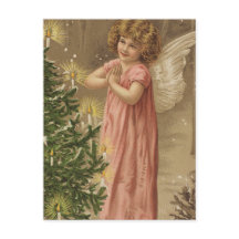 Tiny Pink Garbed Angle bij de kerstboom