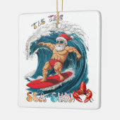 Tis De Zee-Zon - Surfende Kerstman Keramisch Ornament (Links)