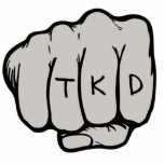 TKD Fist-Ornament Fotobeeldje Ornament<br><div class="desc">Het TKD Fist Ornament maakt een uniek taekwondo cadeau idee voor een verjaardag,  kerst,  vakantie of riem rang promotie test of examen. Dit ornament voor vechtsporten heeft een vuistontwerp in een middelste stoot (met dank aan designious.com) met de letters tkd op de knokkels.</div>