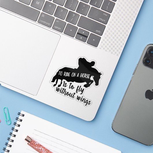 To Ride on a Horse is to Fly without Wings Sticker (Laptop met iPhone)