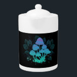Toadvoorraad in Bushes Theepot<br><div class="desc">Mysterious,  bioluminescent,  hallucinogenic,  bright toadstools with bushes of marsh plantages on night,  dark,  glowing background. Glowing mushrooms. Goblincore,  Mushroomcore</div>