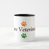 Toekomstige diergeneeskundige en kleurrijke verf a mok (Midden)