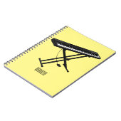 Toetsenbordpianorafbeelding cartoon notitieboek (Linkerzijde)