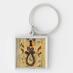 Toetsengat en hart sleutelhanger