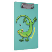 Toevallige groene gekko hagedis met cartoon van in klembord (Rechts)