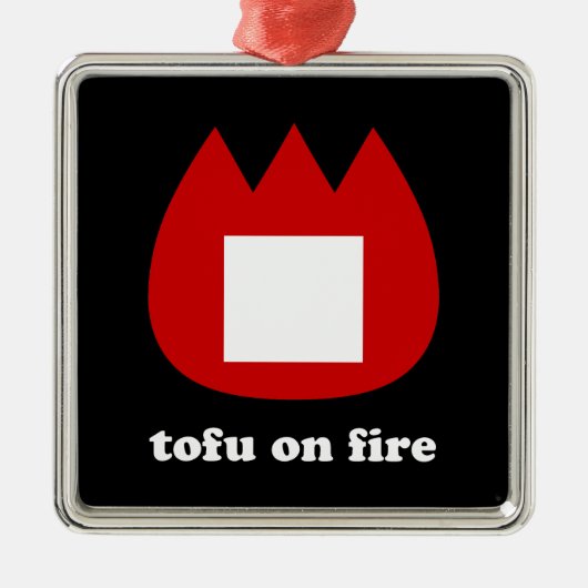 📛 tofu in brand metalen ornament (Voorkant)