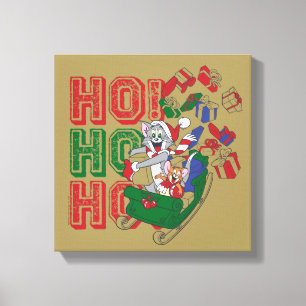 Tom en Jerry die cadeautjes in een slee leveren Canvas Afdruk