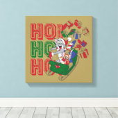 Tom en Jerry die cadeautjes in een slee leveren Canvas Afdruk (Insitu (Houten vloer))