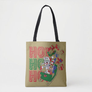 Tom en Jerry die cadeautjes in een slee leveren Tote Bag