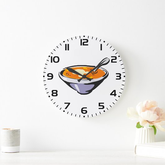 Tomatensoep met lepel grote klok