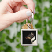 Tongue uit de zwarte en witte terrier sleutelhanger (Hand)