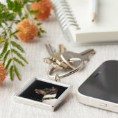 Tongue uit de zwarte en witte terrier sleutelhanger (Zijkant)