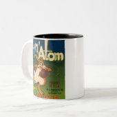 Tot op het  Atom-krateletiket Tweekleurige Koffiemok (Voorkant links)